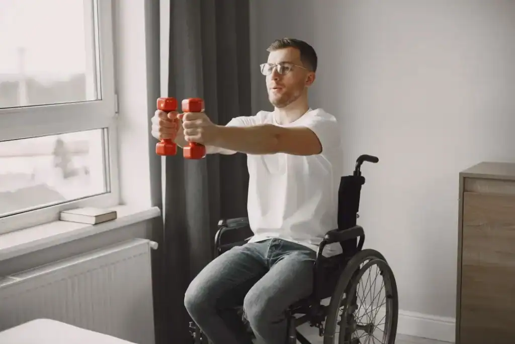 Image of man doing exercise in his wheelchair to aid weight loss Dunstable