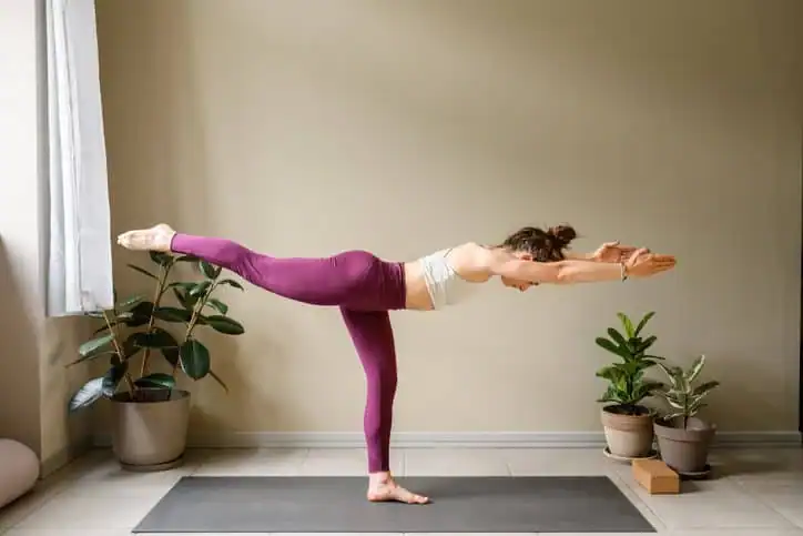 Woman doing Yoga exercise Dunstable to help with toning the body. 